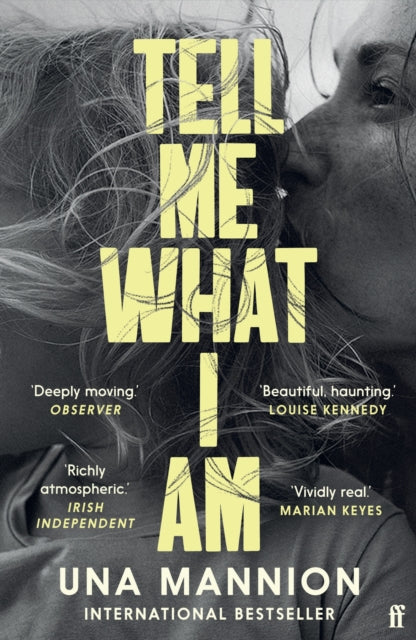 Tell Me What I Am book cover with yellow text on a black and white image.