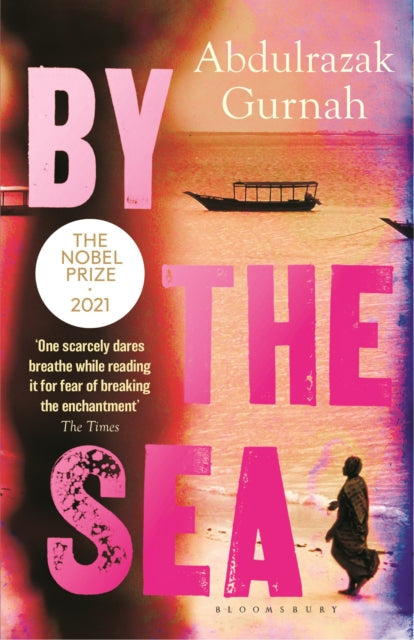 Book cover for By the Sea by Abdulrazak Gurnah, featuring a beach scene.