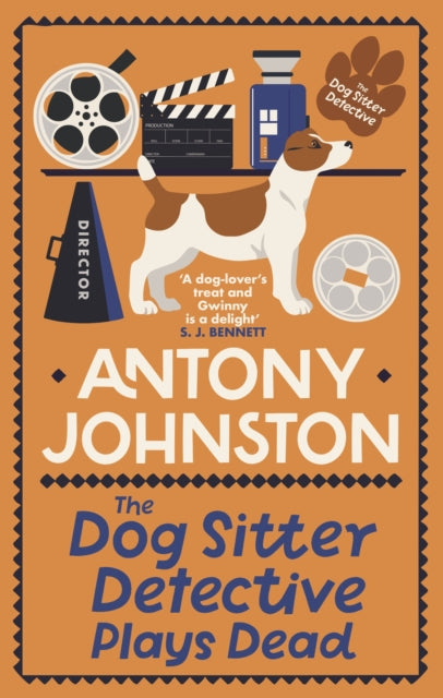 The Dog Sitter Detective Plays Dead book cover with a dog and film equipment.