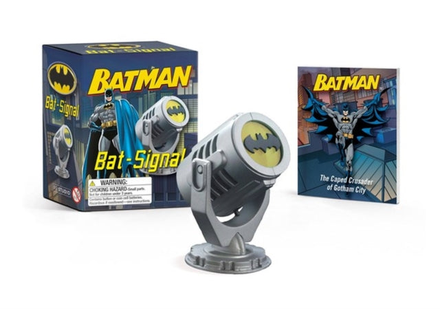 Batman Bat-Signal replica with a book.