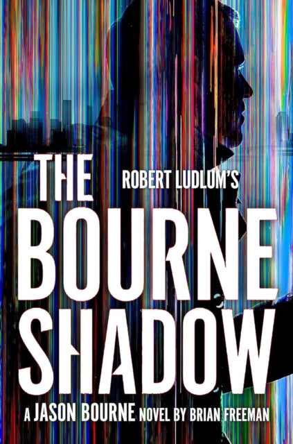 Robert Ludlum's The Bourne Shadow book cover with a silhouetted man.