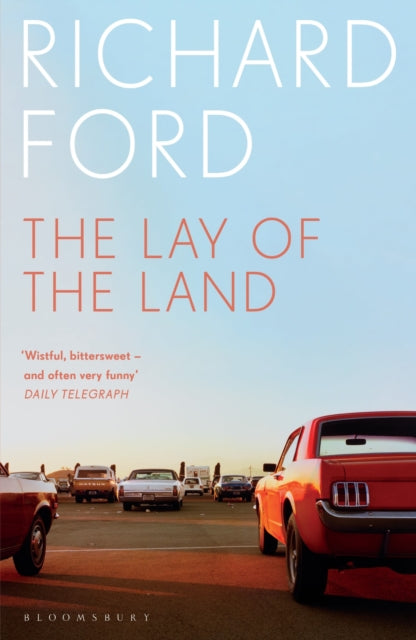 Book cover for The Lay of the Land by Richard Ford, featuring cars.