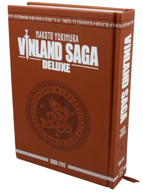 Vinland Saga Deluxe 5 hardcover book with a brown cover and white text.