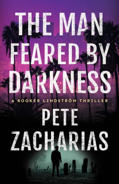The Man Feared by Darkness book cover with a city skyline and palm trees.