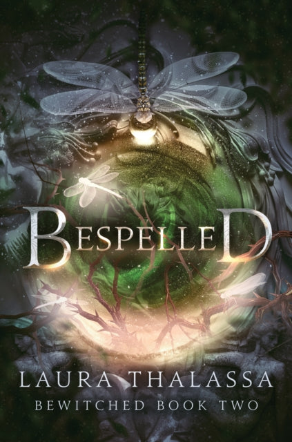Book cover for Bespelled by Laura Thalassa, featuring a dragonfly and a green orb.