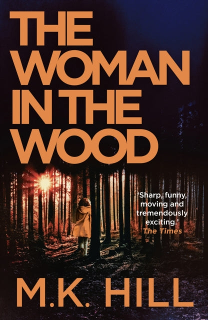 The Woman in the Wood book cover with a person in a forest.