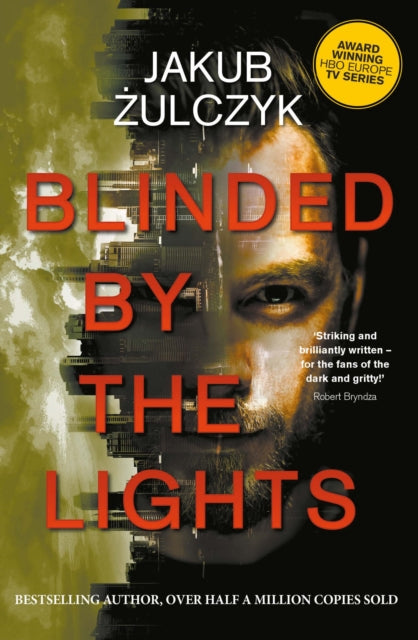 Blinded by the Lights book cover featuring a man's face and city skyline.