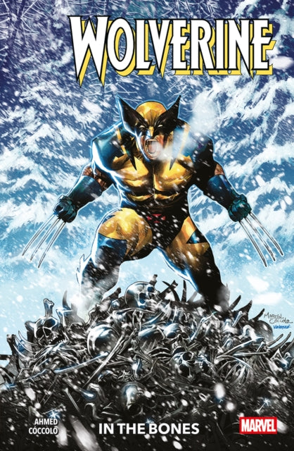 Wolverine stands in the snow amidst a pile of bones.