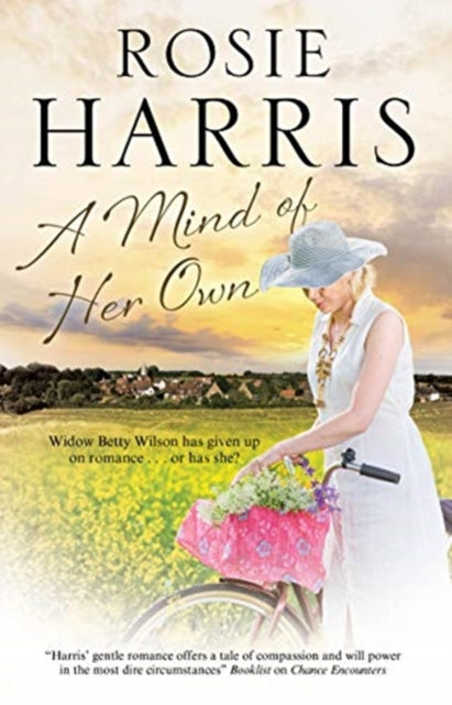 A Mind of Her Own book cover with a woman on a bicycle in a field.