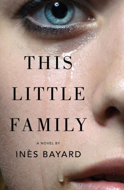 This Little Family book cover with a close-up of a tearful eye.