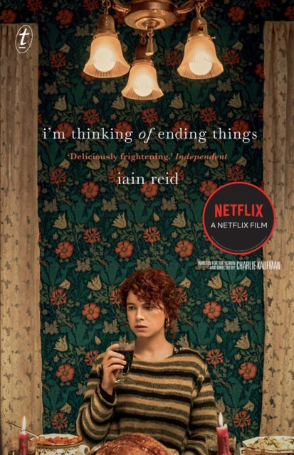 I'm Thinking Of Ending Things movie poster with a woman holding a drink.