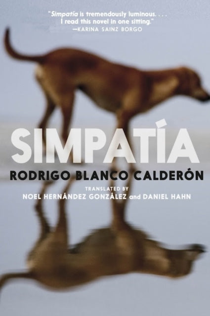 Simpatia book cover with a blurred image of a dog and its reflection.
