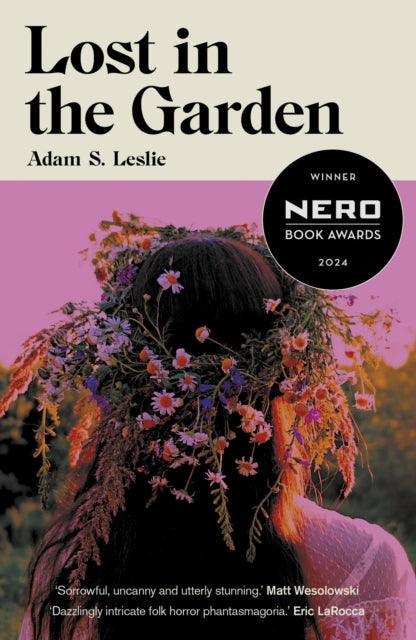 Book cover for "Lost in the Garden" by Adam S. Leslie with a floral wreath.