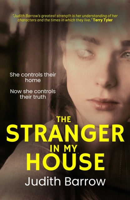 The Stranger in My House book cover featuring a woman's face and title.