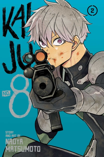 Kaiju No. 8, Vol. 2 manga cover featuring a young man aiming a weapon.