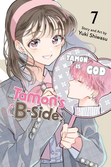 Manga cover for Tamon's B-Side, Vol. 7 featuring a girl holding a fan with an idol's face.