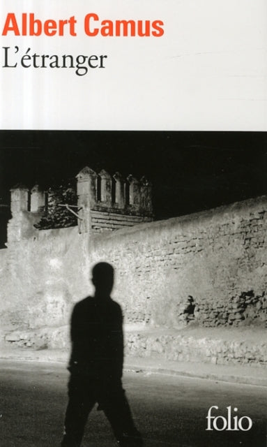 L'etranger by Albert Camus, book cover with silhouette of a man.