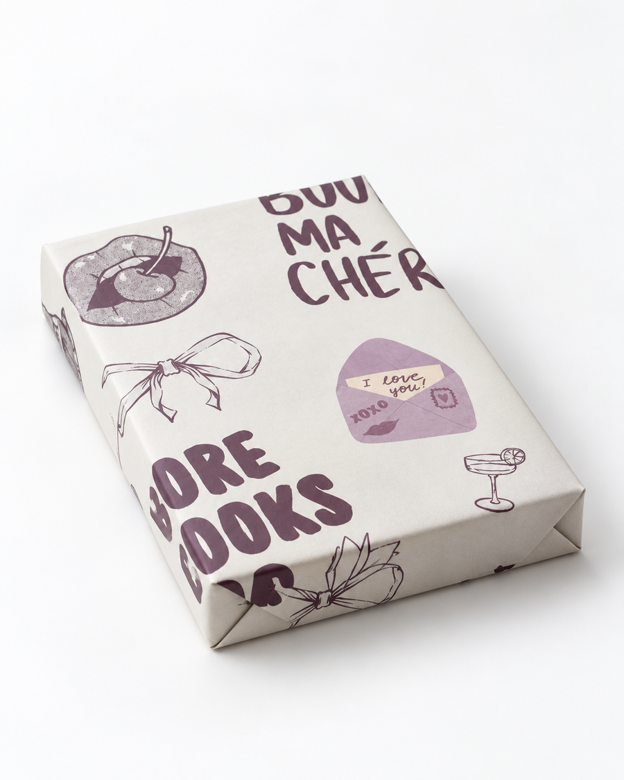 Random blind mystery book wrapped in mauve illustrated paper