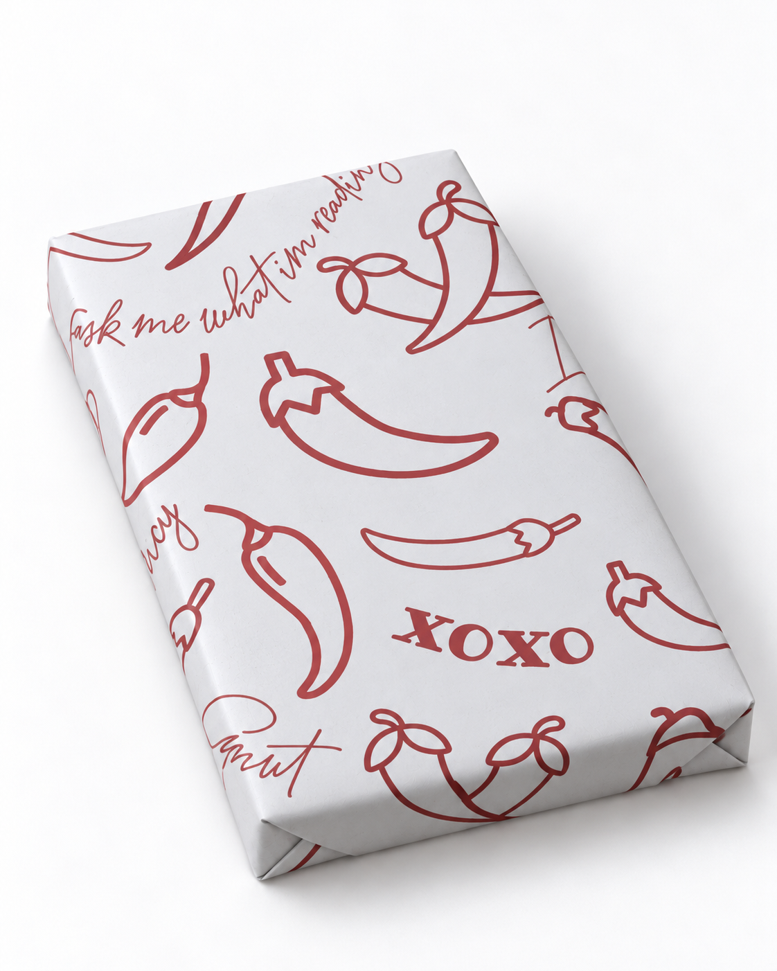 Spicy mystery book wrapped in red chilli print paper