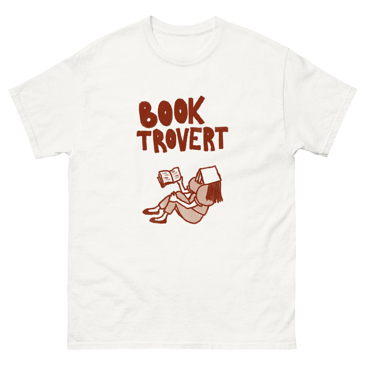 White t-shirt with "Booktrovert" text and a drawing of a person reading.