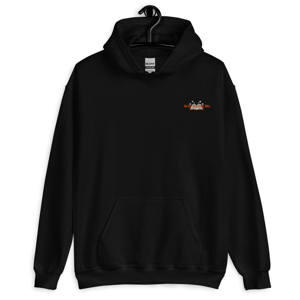 Black Gildan hoodie with "In My Reading Era" text and an open book graphic.