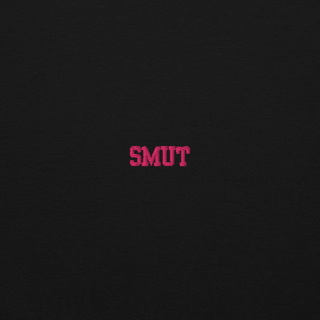 Black hoodie with pink embroidered text that says "SMUT".