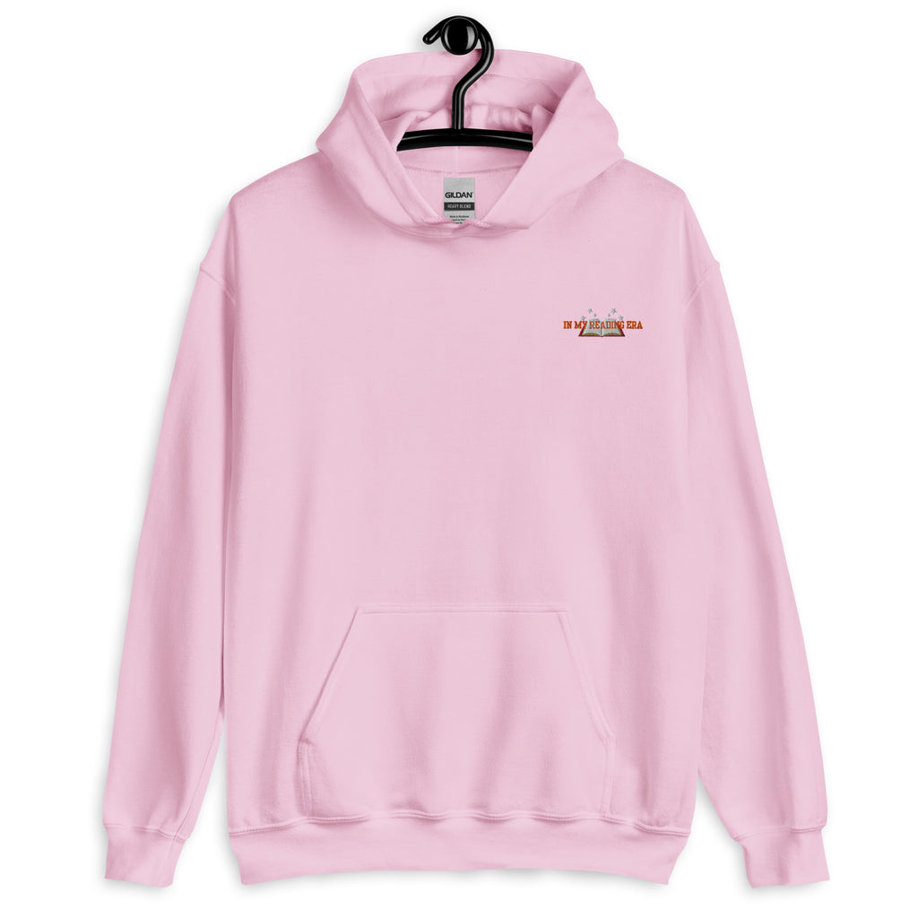Pink Gildan hoodie with "In My Reading Era" graphic.
