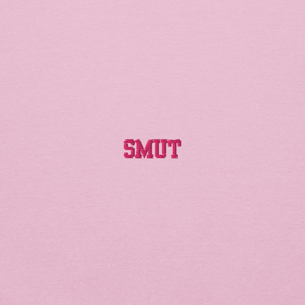 Pink hoodie with pink embroidered text that says SMUT.