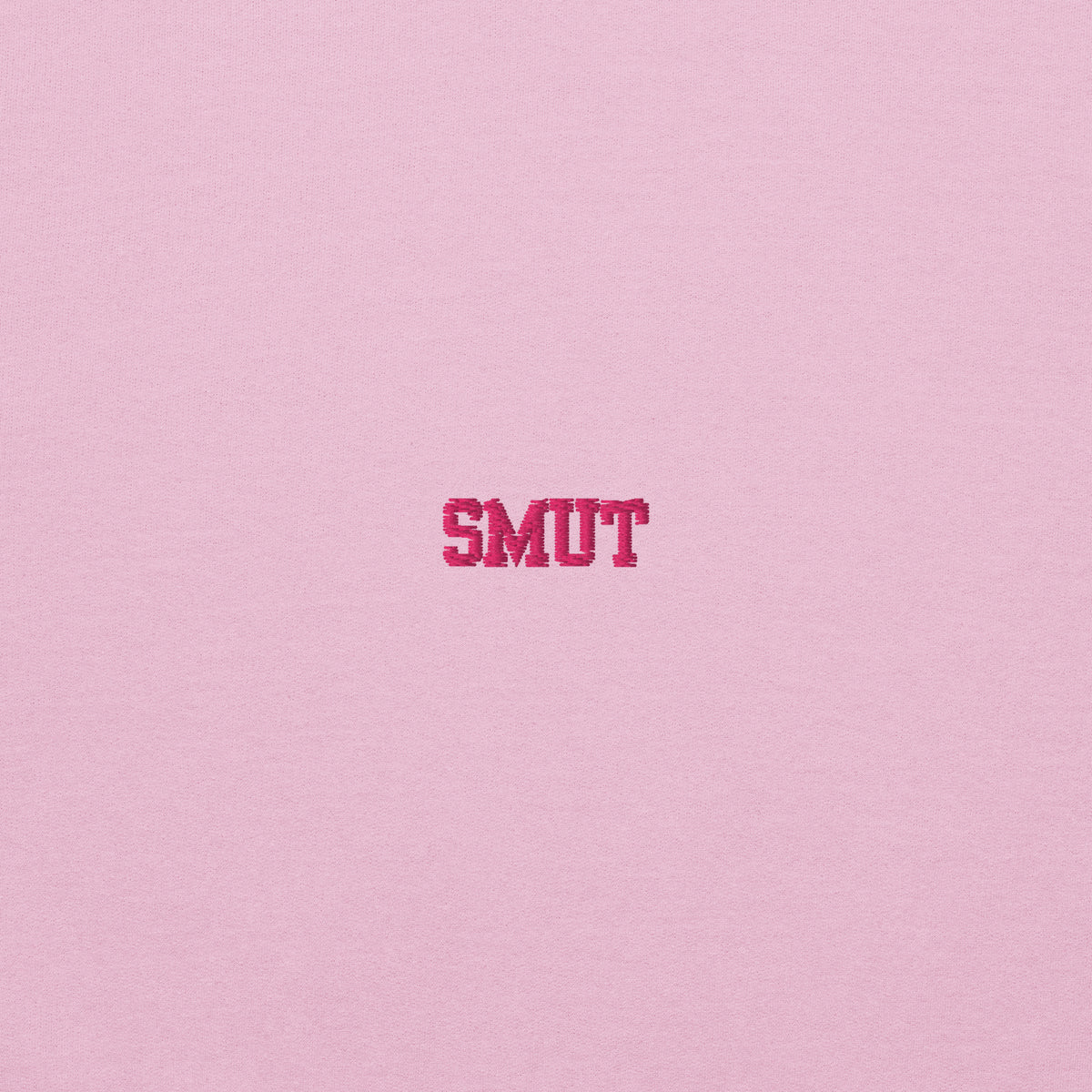 Pink hoodie with pink embroidered text that says SMUT.