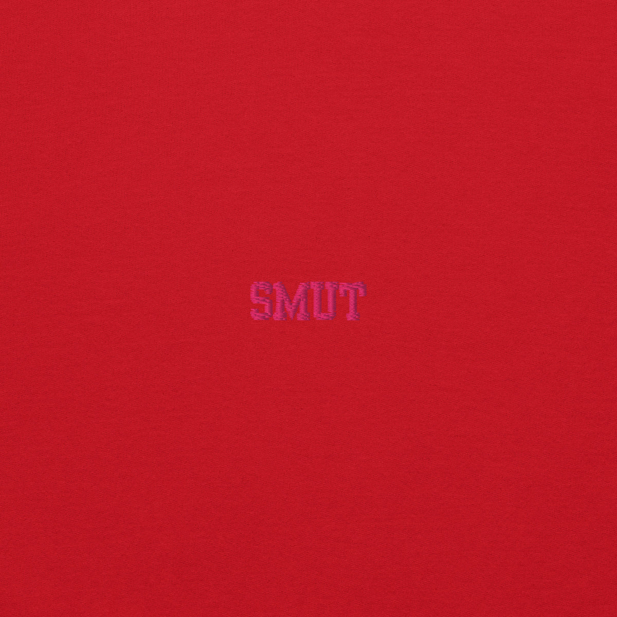 Red hoodie with pink lettering that says "SMUT".