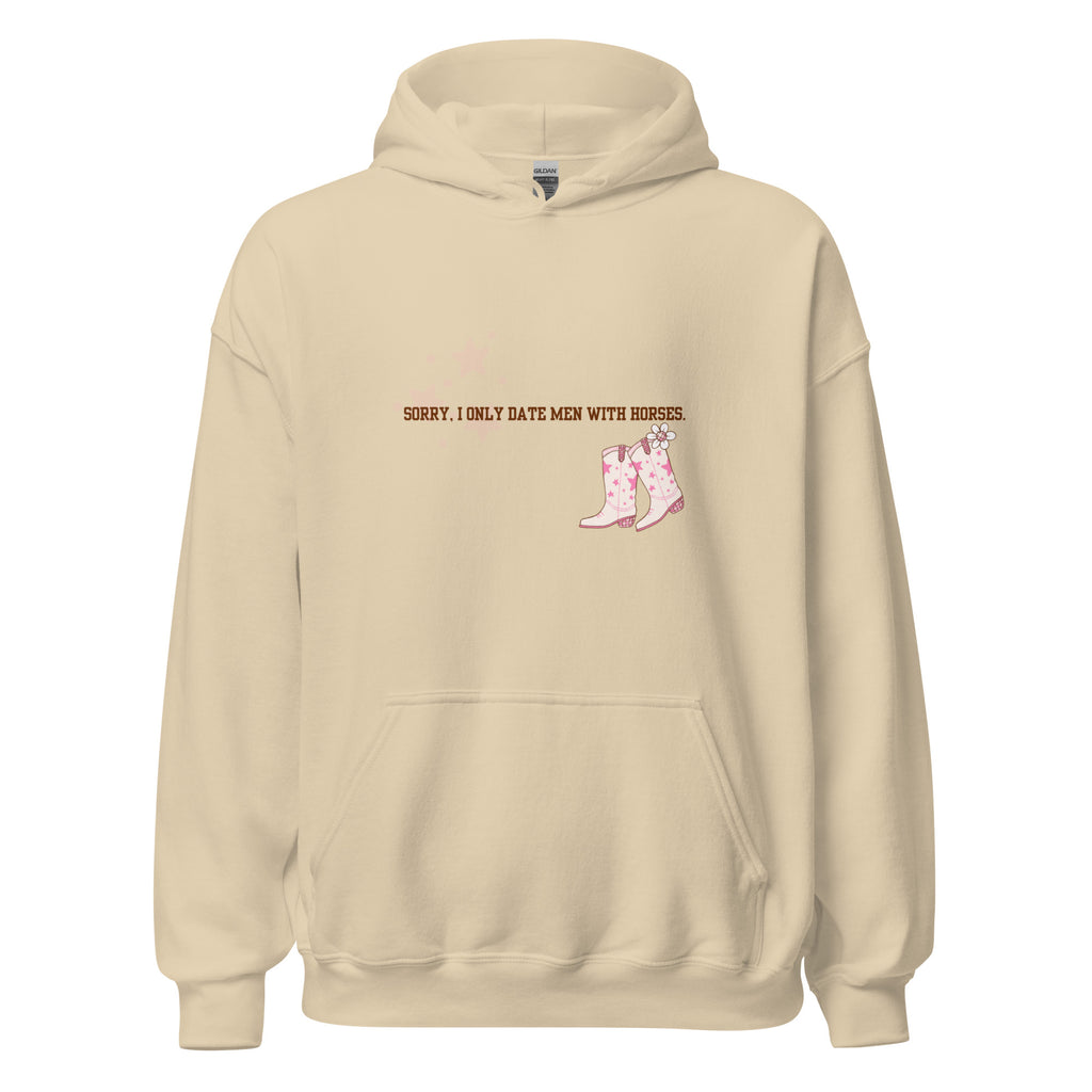 A beige hoodie with the text "Sorry, I only date men with horses" and an illustration of pink cowboy boots.
