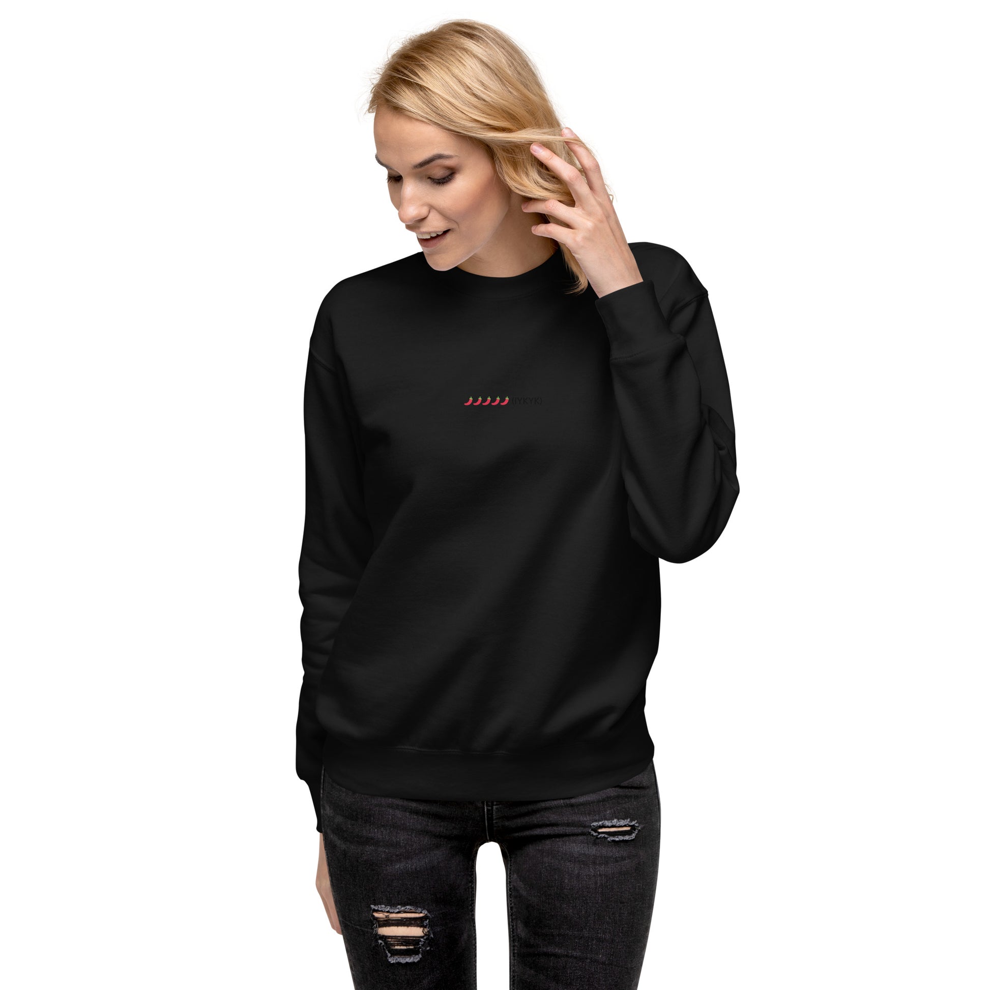 Black sweatshirt with a small embroidered chili pepper design and text.