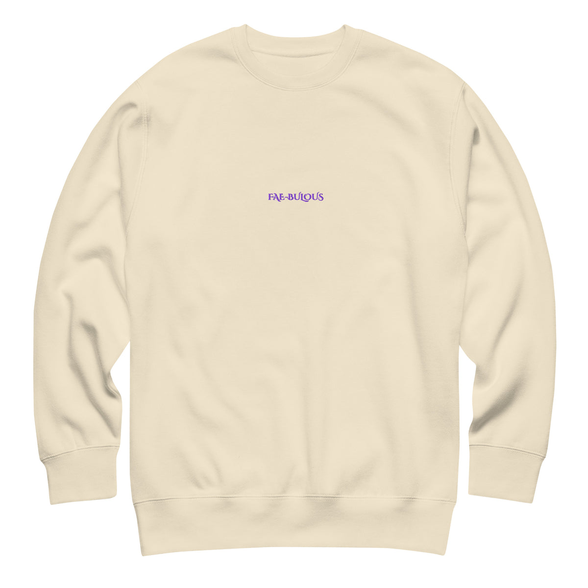 A cream-colored sweatshirt with "Fae-bulous" embroidered in purple.