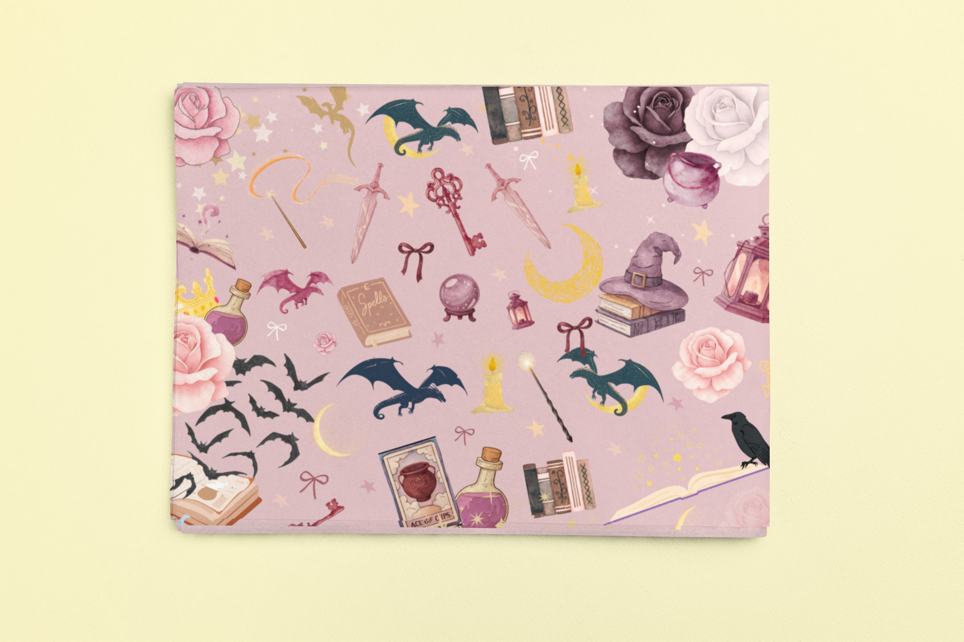 Romantasy bookish wrapping sheets with a pink background and magical illustrations.