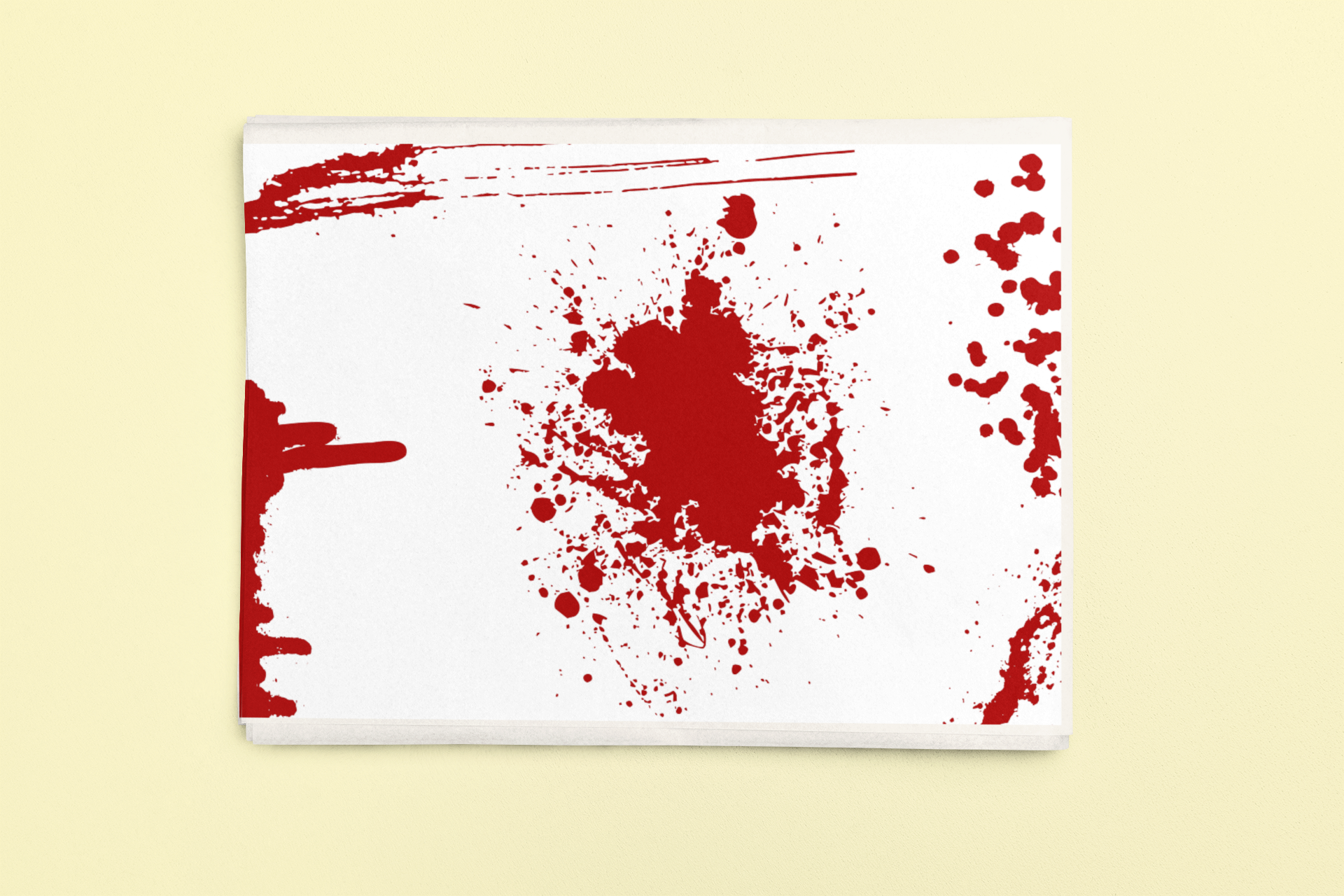 Dark Romance wrapping sheets with red splatters on white paper.