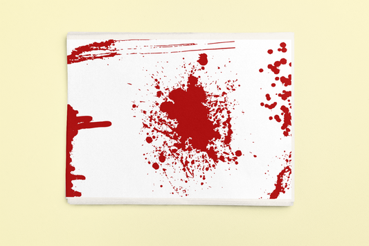 Dark Romance wrapping sheets with red splatters on white paper.